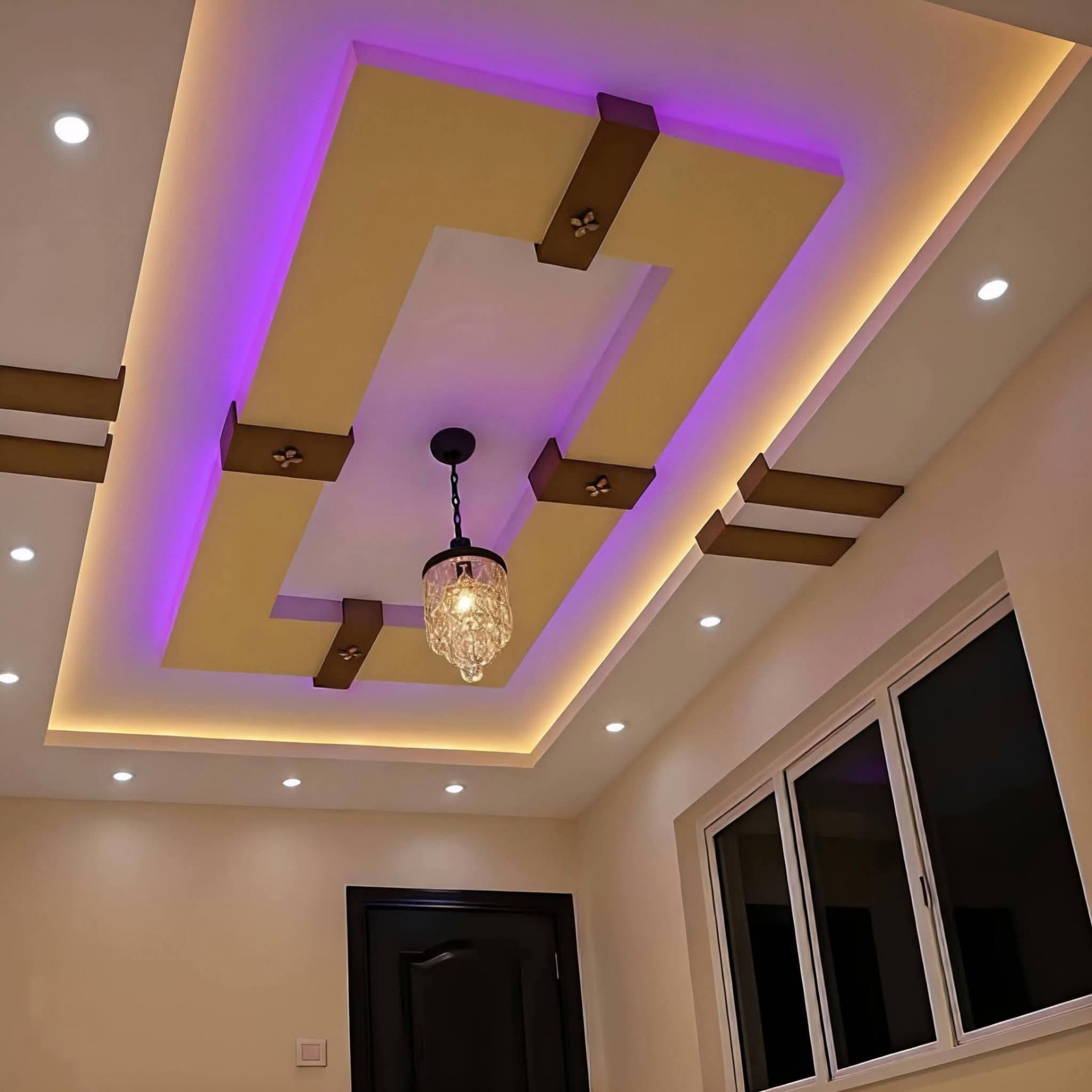 Modern Ceiling Design with Recessed Lighting and Chandelier