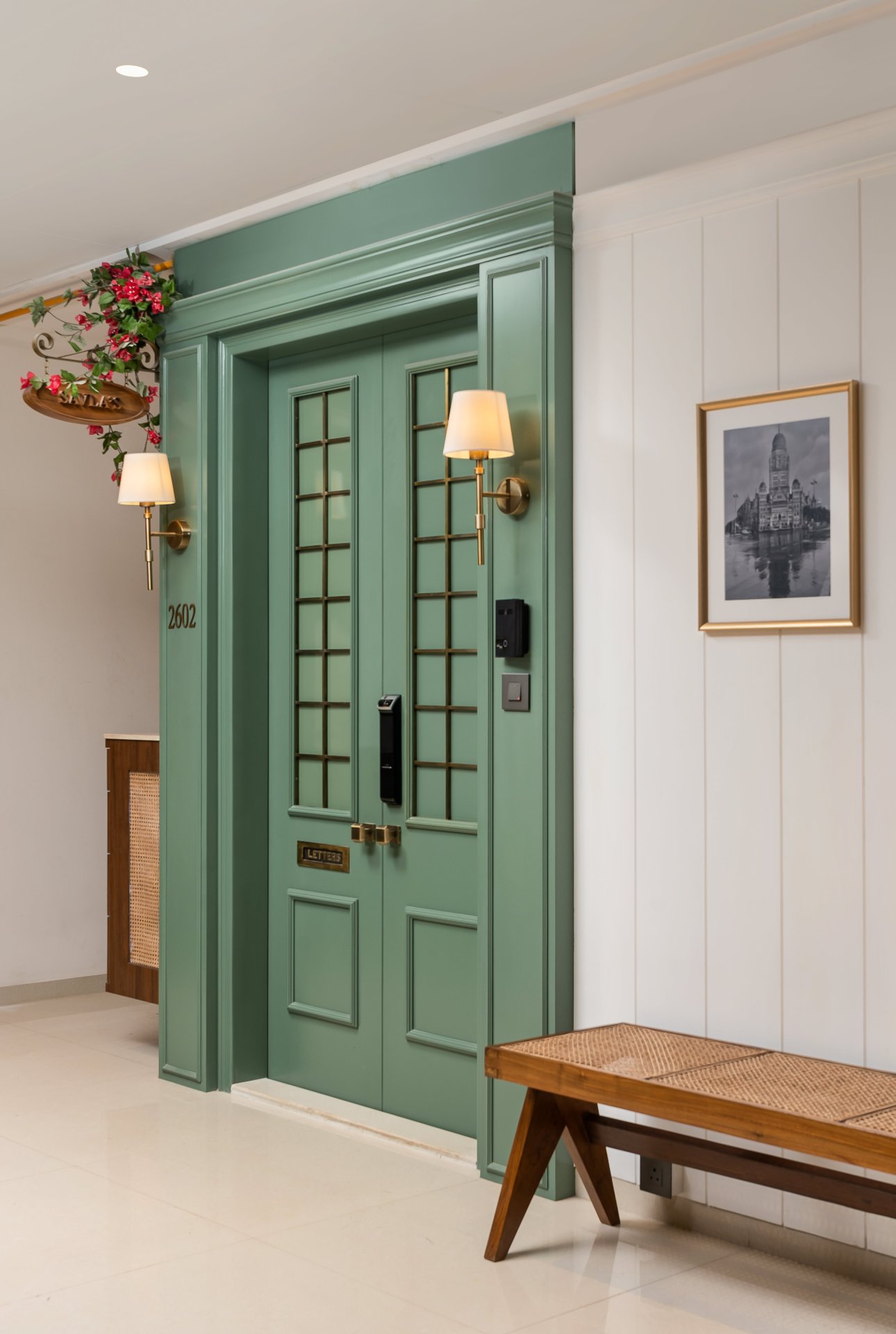 Elegant Green Double Entry Door with Brass Accents